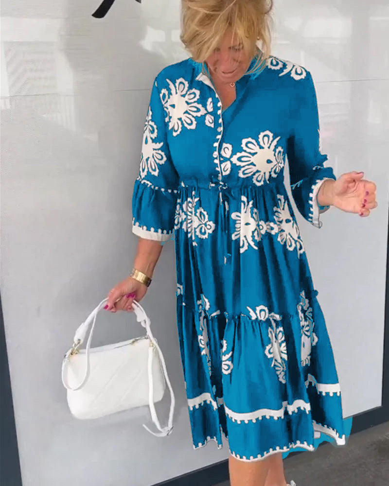 Claudette – Vrouwelijke midi-jurk met grafisch borduurmotief