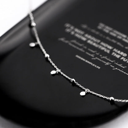 Fijne dames choker ketting met druppelaccenten