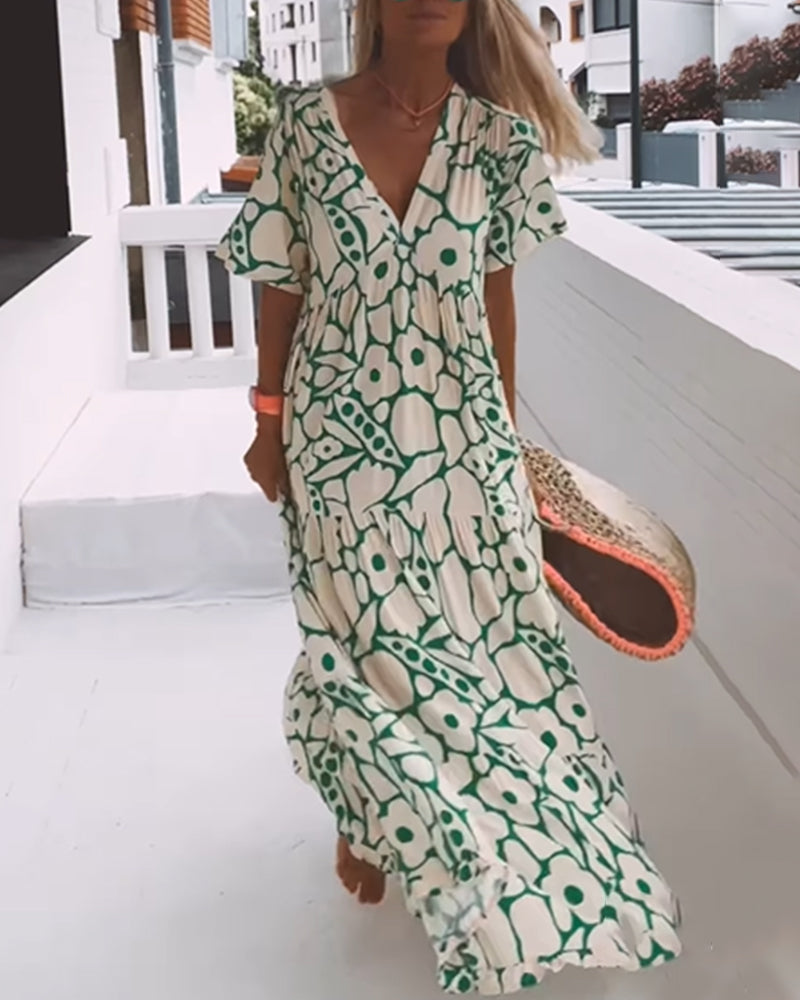 Melania – Luchtige maxi-jurk met abstracte bloemenprint