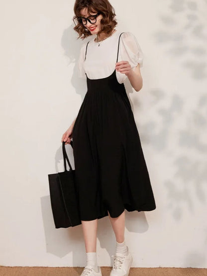 Lidia – Dames set met pofmouwtop en midirok met bandjes