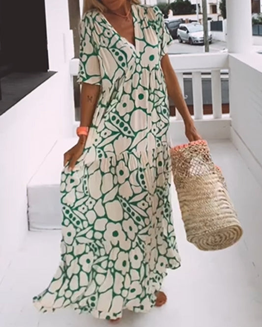 Melania – Luchtige maxi-jurk met abstracte bloemenprint