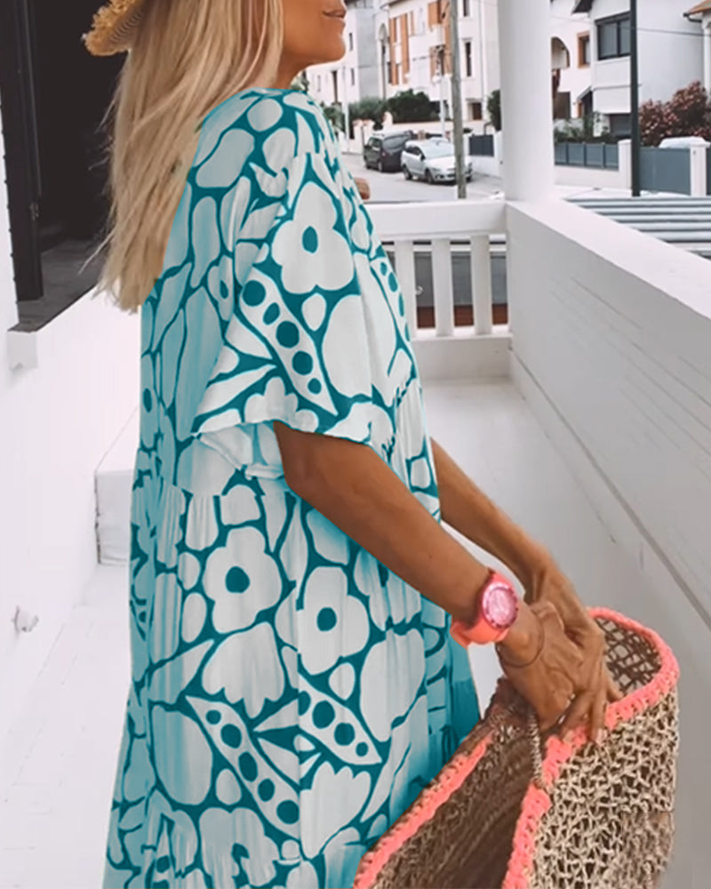 Melania – Luchtige maxi-jurk met abstracte bloemenprint