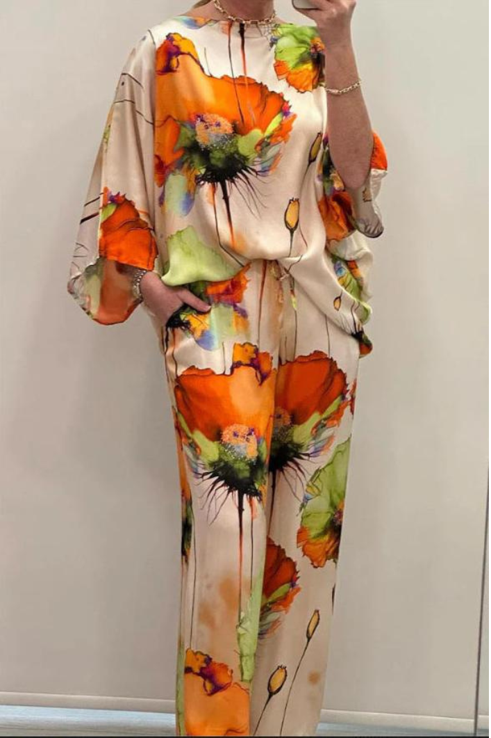 Teresa – Luxe damespak met expressieve bloemenprint