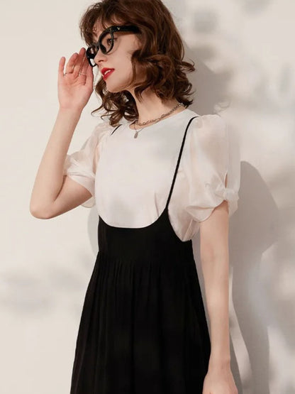 Lidia – Dames set met pofmouwtop en midirok met bandjes