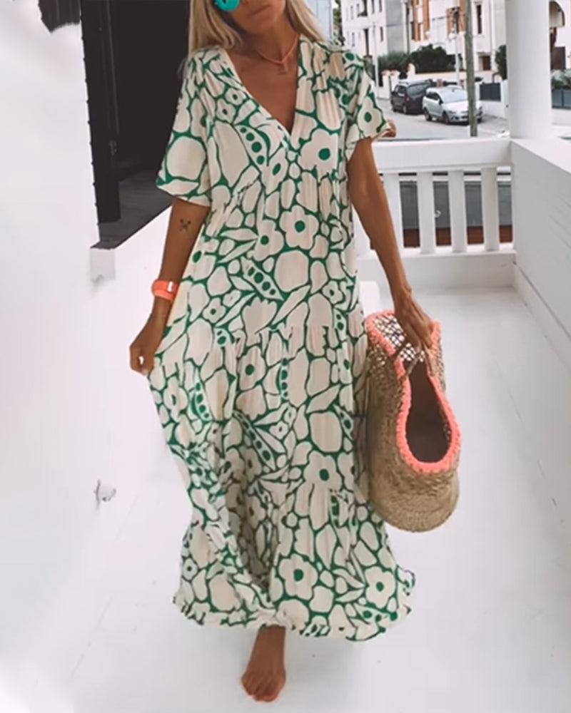 Melania – Luchtige maxi-jurk met abstracte bloemenprint