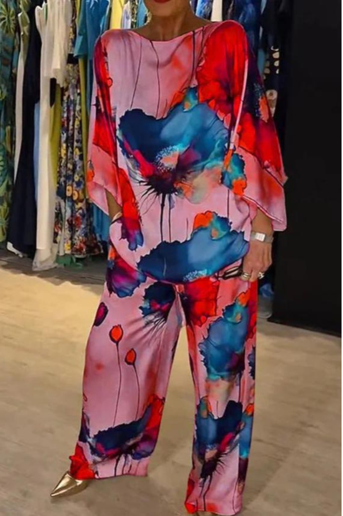 Teresa – Luxe damespak met expressieve bloemenprint