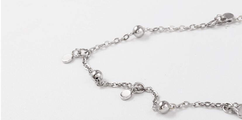 Fijne dames choker ketting met druppelaccenten