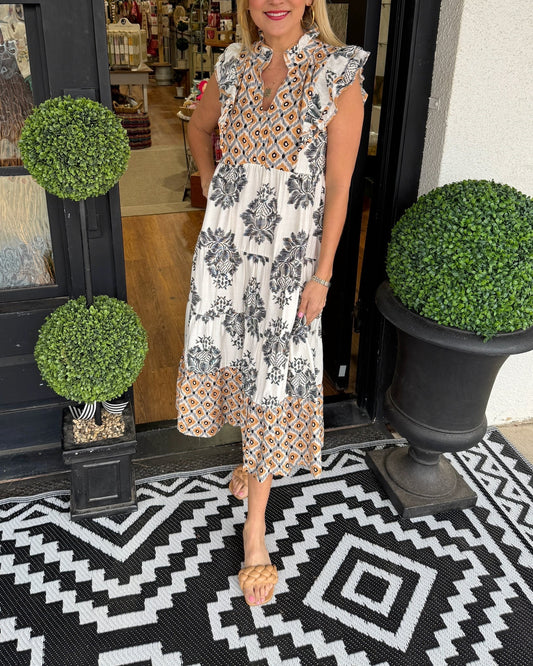 Birgit - Mouwloze zomerjurk met volantkraag en bloemenprint