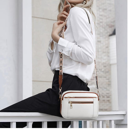 Zamfira - Crossbody damestas met ritsvakken en verstelbare band
