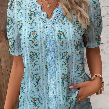 Aino – Elegante V-hals kanten blouse