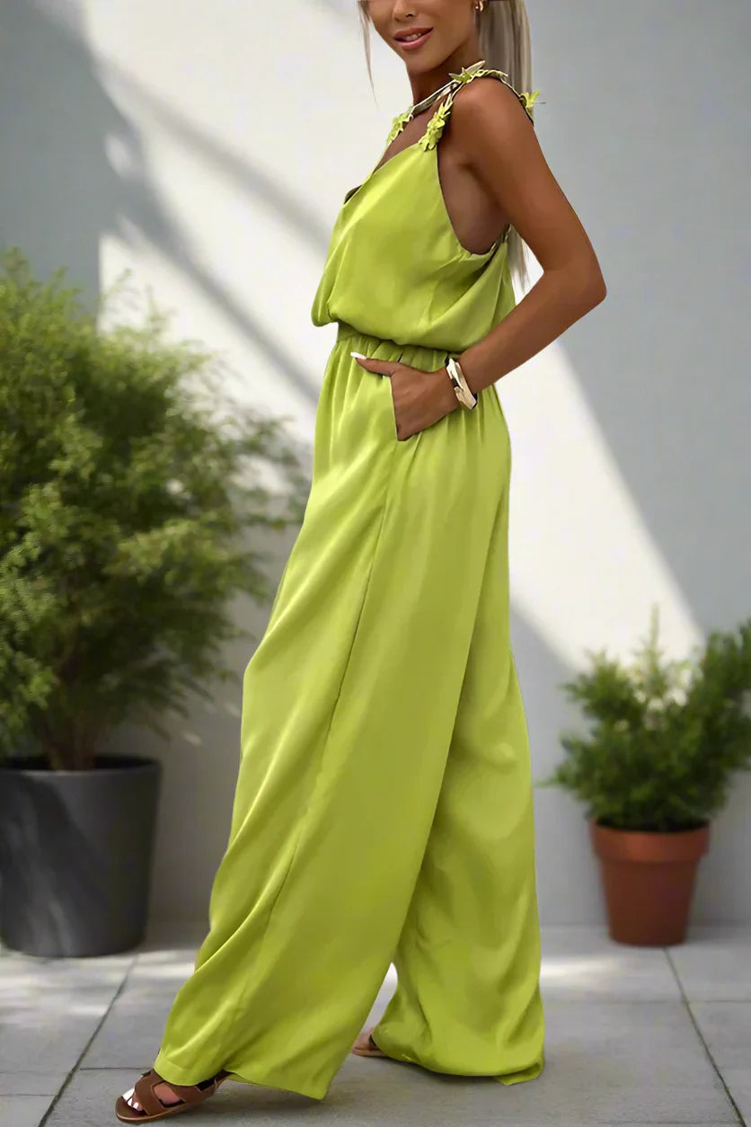 Ursula - Dames mouwloze jumpsuit met bloemenbandjes en wijde pijpen