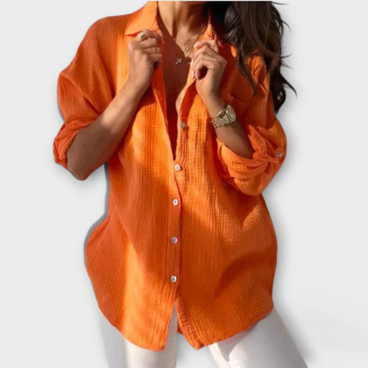 Irina - Losvallende dames blouse met knopen en opgerolde mouwen