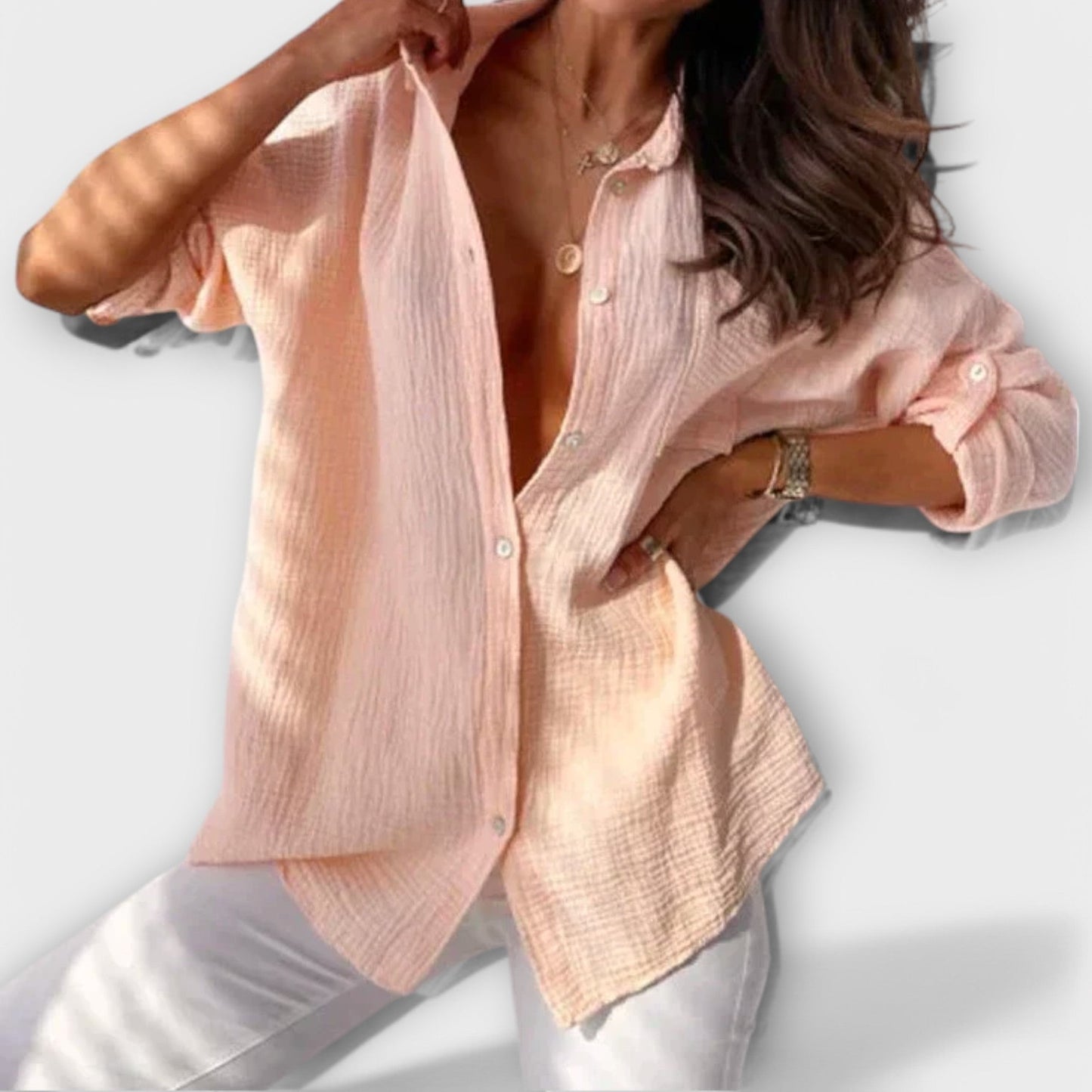 Irina - Losvallende dames blouse met knopen en opgerolde mouwen