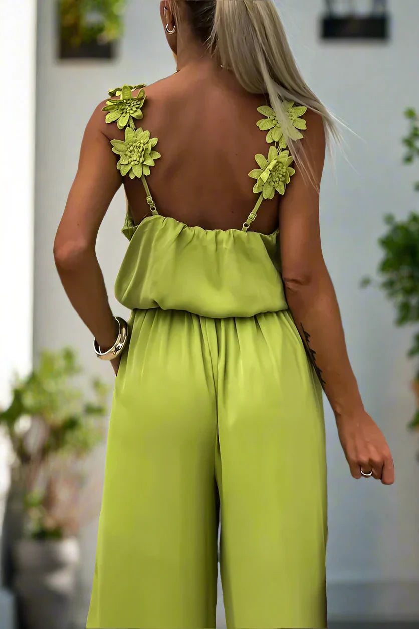 Ursula - Dames mouwloze jumpsuit met bloemenbandjes en wijde pijpen