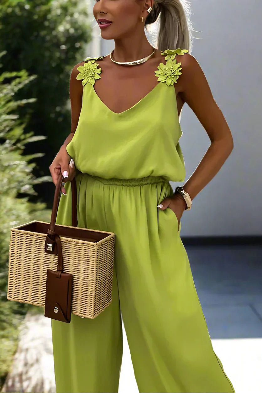 Ursula - Dames mouwloze jumpsuit met bloemenbandjes en wijde pijpen