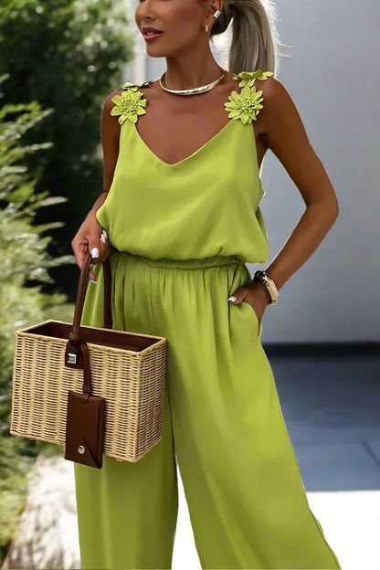 Ursula - Dames mouwloze jumpsuit met bloemenbandjes en wijde pijpen