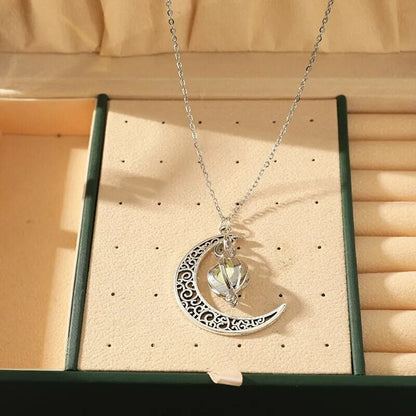 Glanzende damesketting met maanvormige hanger