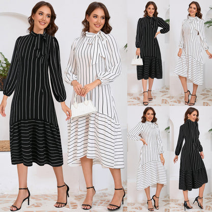 Alazne - Midi jurk met strikdetail en lange mouwen