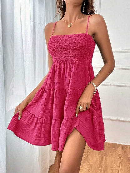 Ayelen - Korte dames zomerjurk met smock bovenstuk en spaghettibandjes