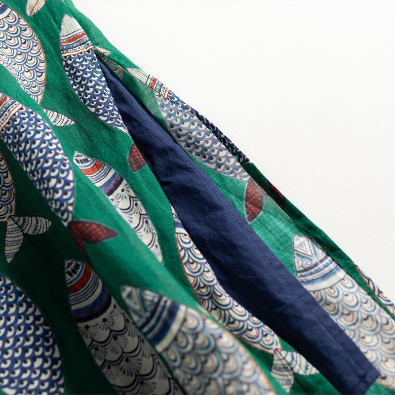 Sylvaine - Mouwloze dames maxi jurk met doorknoop en strikdetail