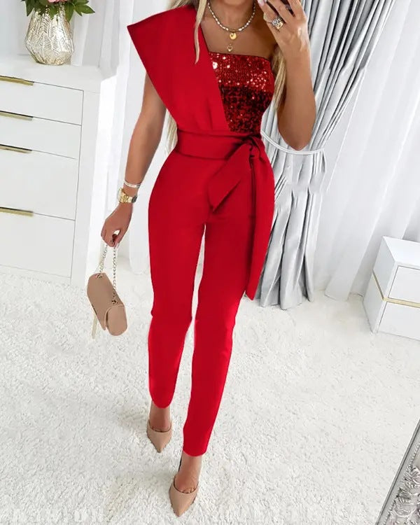 Danique – Glitter jumpsuit met asymmetrische schouder voor dames