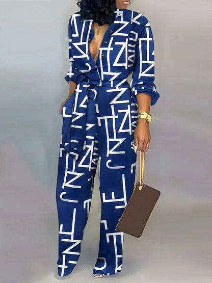 Aessia – Wijde damesjumpsuit met strikceintuur en diepe halslijn