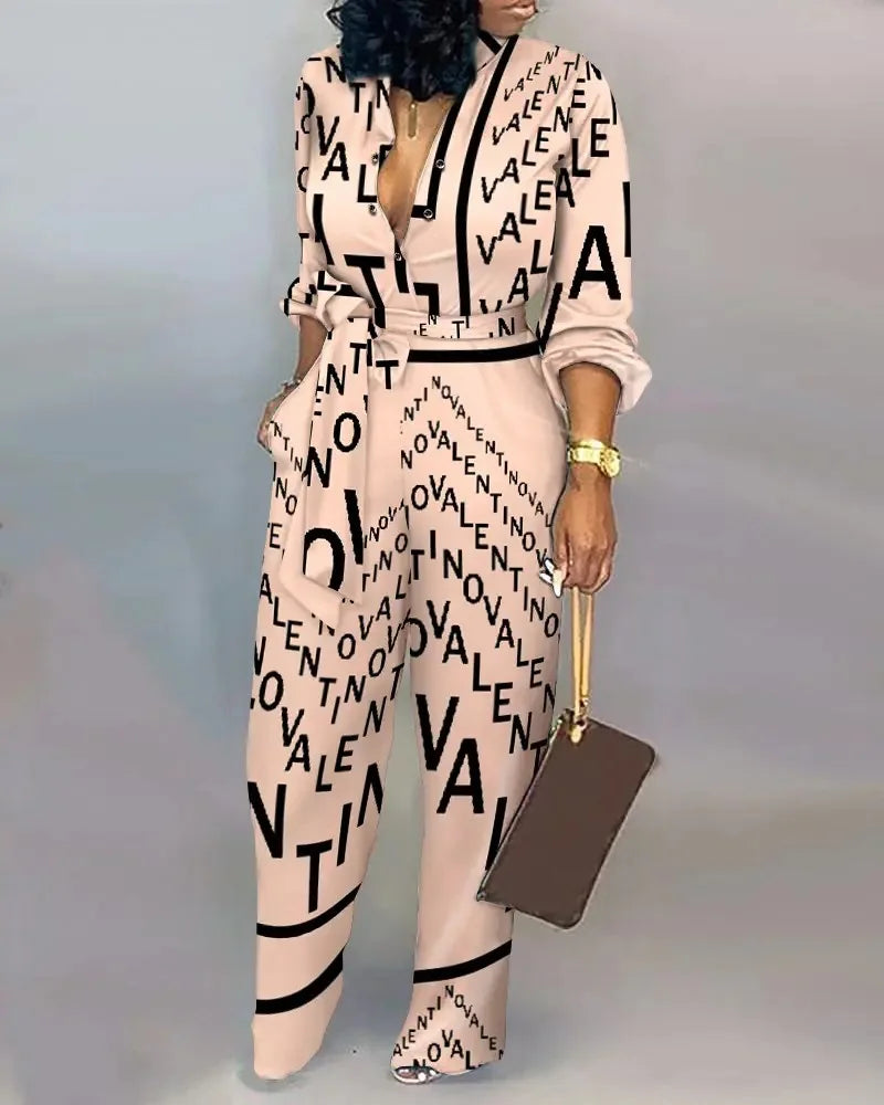 Aessia – Wijde damesjumpsuit met strikceintuur en diepe halslijn