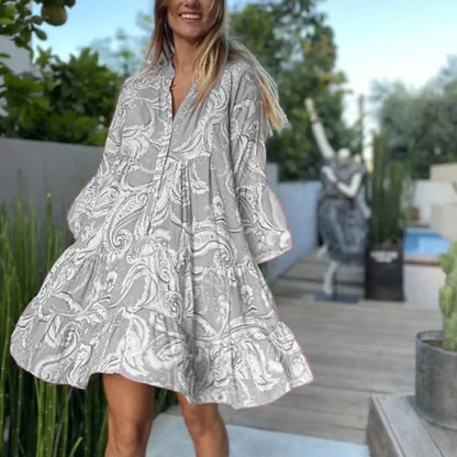 Theodelinda  - Korte zomerjurk met print en volantzoom