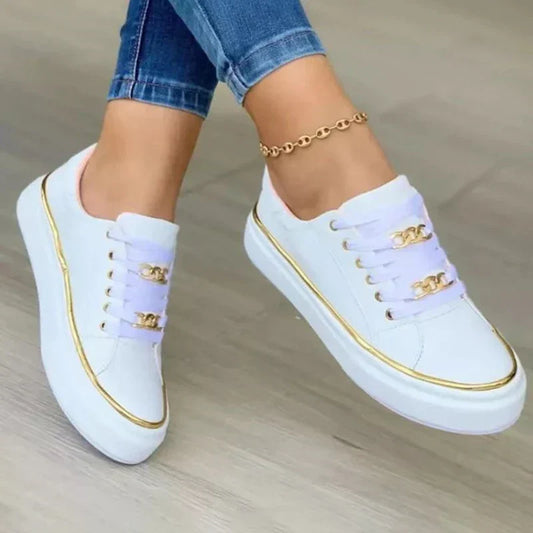 Kate – Lage damessneakers met gouden accenten