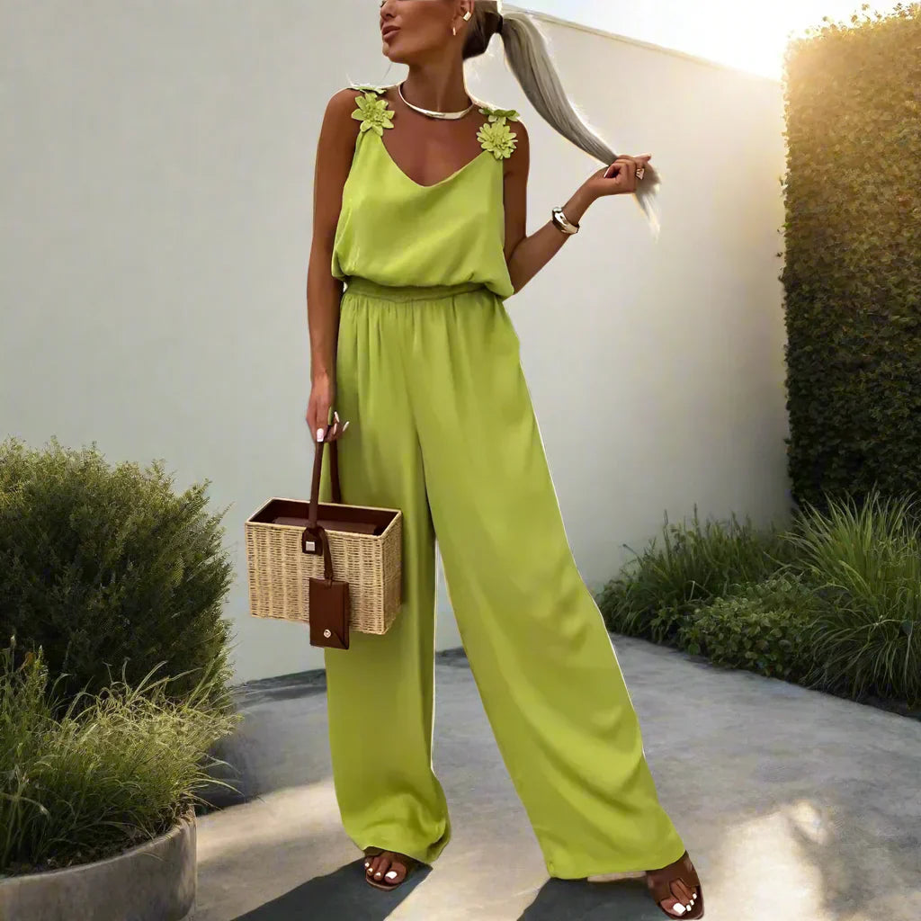 Ursula - Dames mouwloze jumpsuit met bloemenbandjes en wijde pijpen