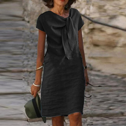 Tullia | Elegante jurk met strikdetail