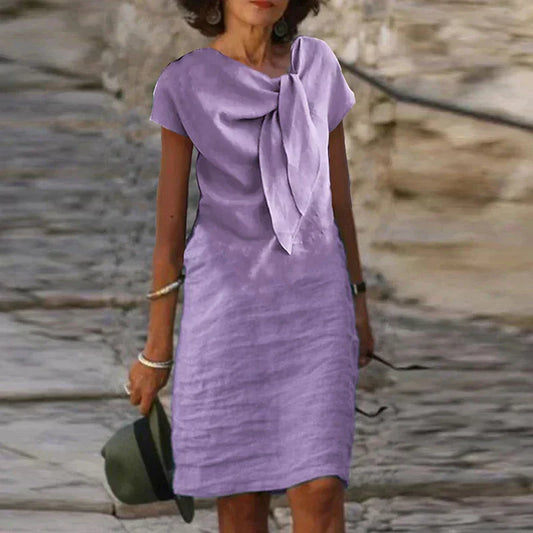 Tullia | Elegante jurk met strikdetail