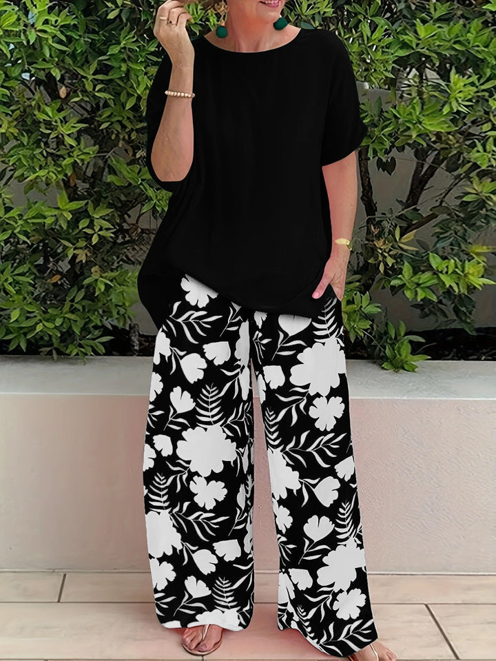 Malika - Tweedelige dames set met losse top en wijde bloemenbroek