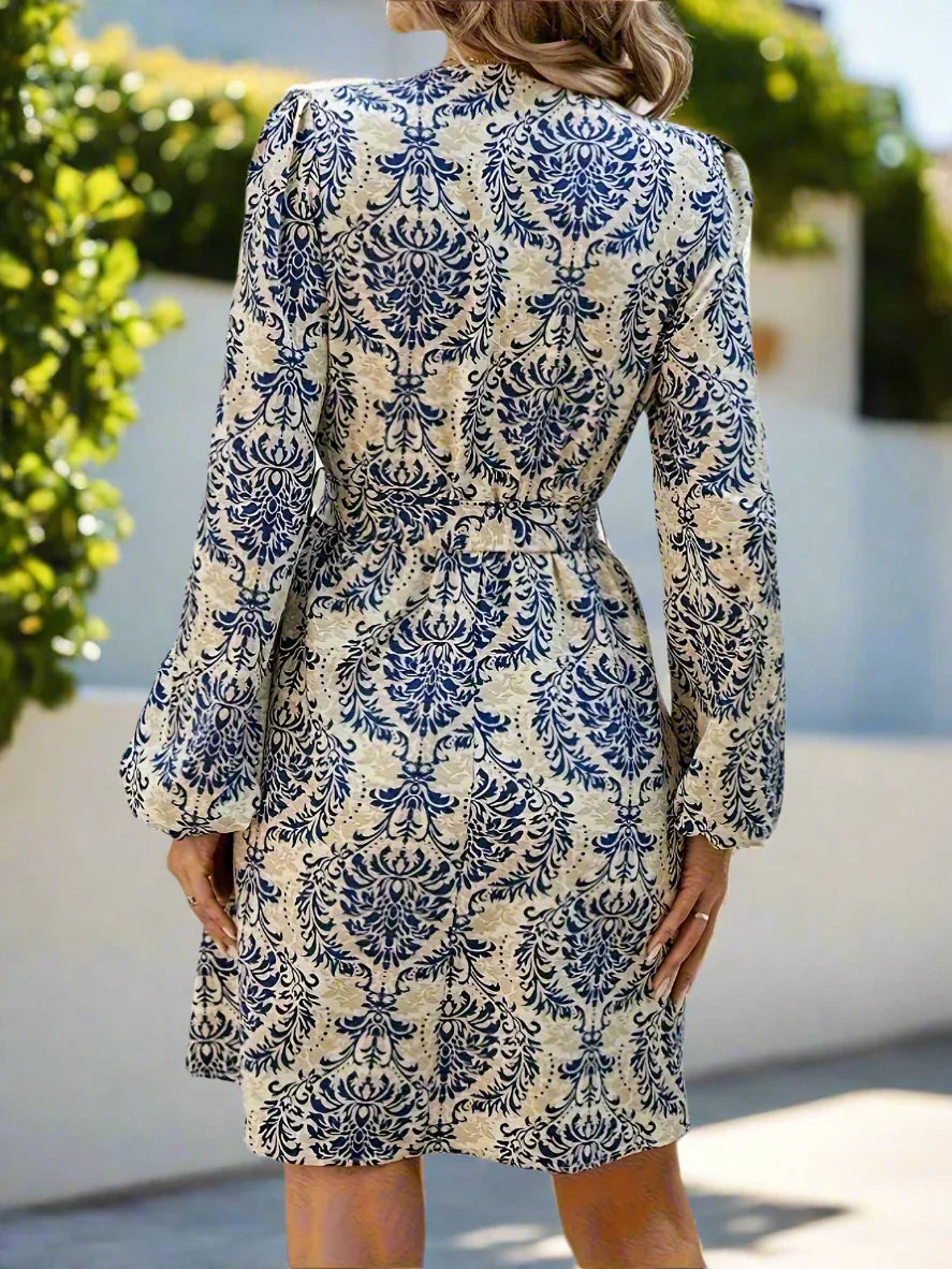 Charlotte – Dames wikkeljurk met lange mouwen en tailleaccent