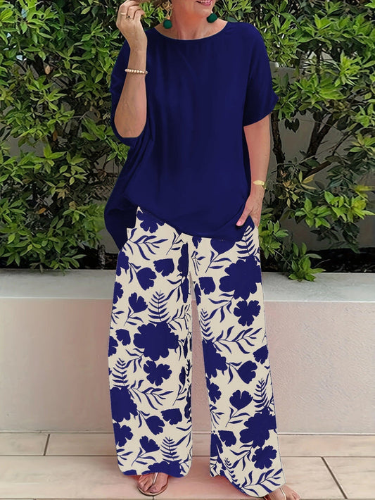 Malika - Tweedelige dames set met losse top en wijde bloemenbroek