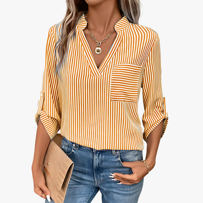 Sylvie - Gestreepte dames blouse met V-hals en borstzak