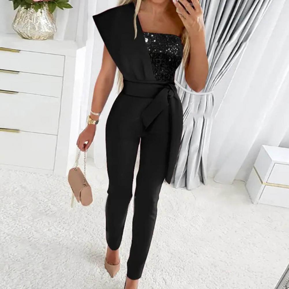 Danique – Glitter jumpsuit met asymmetrische schouder voor dames