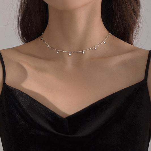 Fijne dames choker ketting met druppelaccenten