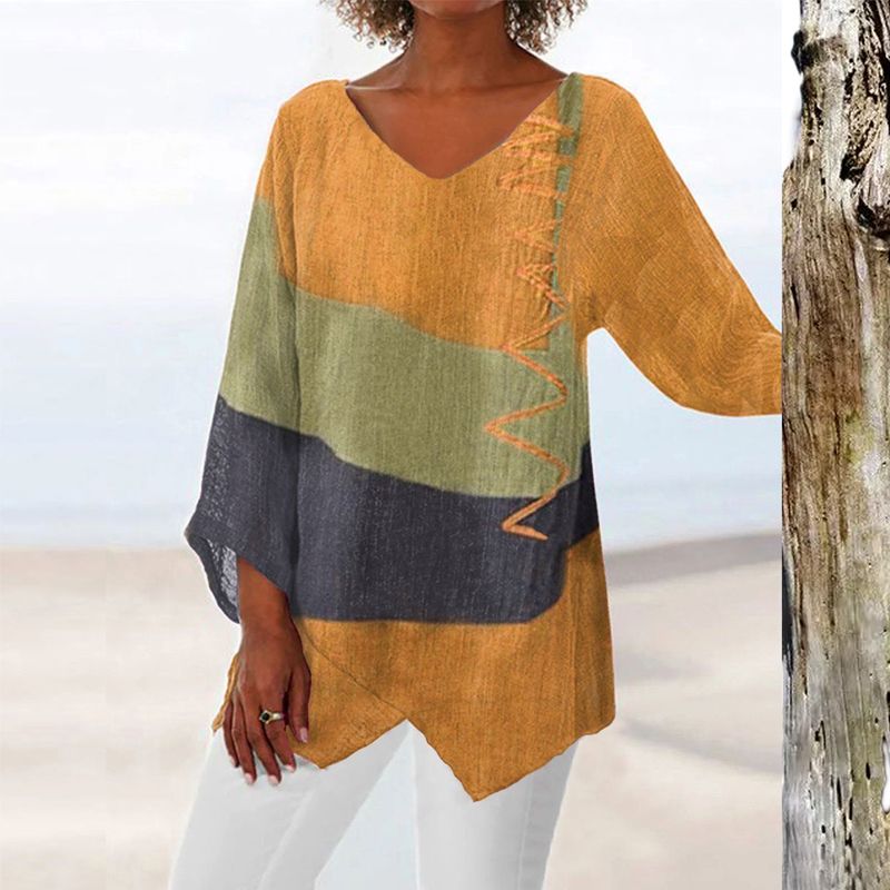 Petronela - Luchtige dames top met asymmetrische zoom
