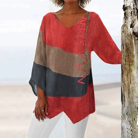 Petronela - Luchtige dames top met asymmetrische zoom